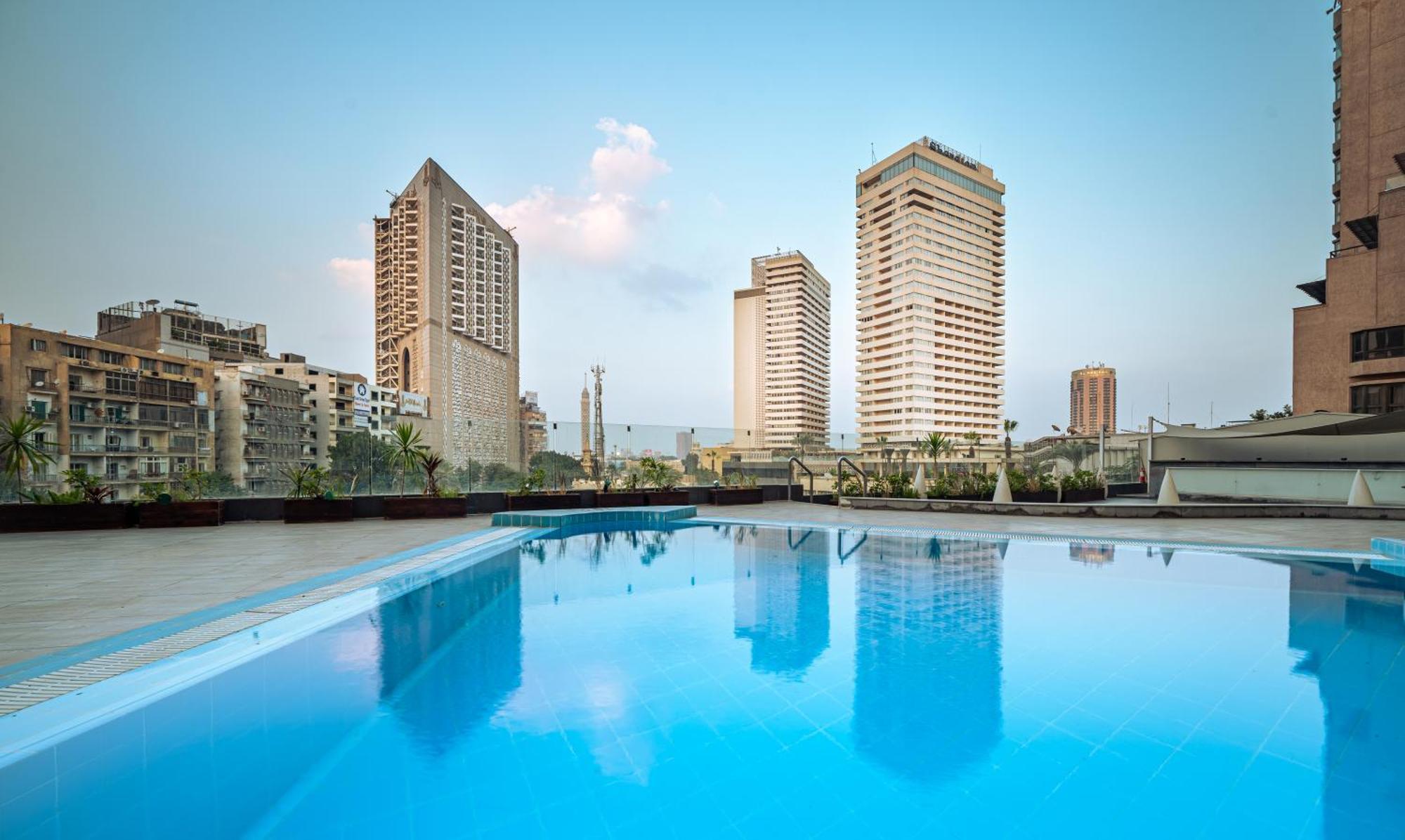 Pyramisa Downtown Residence Hotel Cairo Giza Extérieur photo